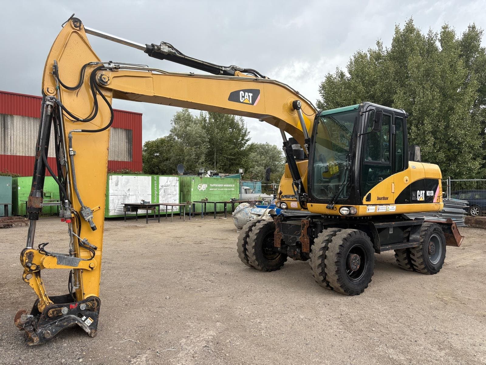 Caterpillar M313D foto 1